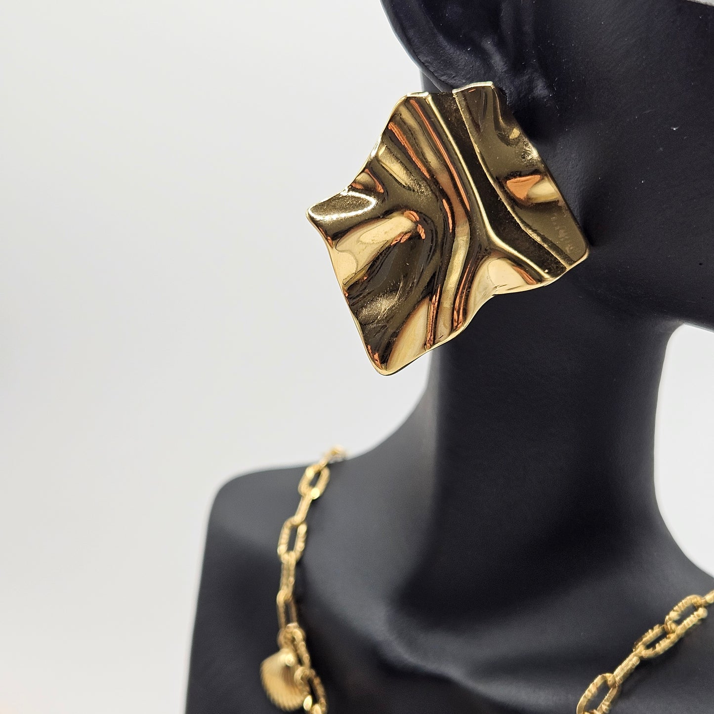 Calypso - Boucles d'oreilles en acier Inoxydable doré